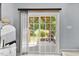 Stylish sliding glass door offering backyard access and natural light in the home at 7856 Spungold St, Raleigh, NC 27617