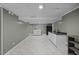 Basement featuring laundry area, kitchenette with ample countertop space and storage at 7916 Foxwood Dr, Raleigh, NC 27615