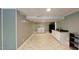 Basement with laundry area, kitchenette, offering functionality and ample space at 7916 Foxwood Dr, Raleigh, NC 27615