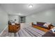 Spacious living room with lots of natural light, stylish furnishings, and neutral paint at 7916 Foxwood Dr, Raleigh, NC 27615