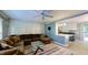 Bright living room showcasing a large sectional sofa, contemporary furnishings, and an open-concept design at 7916 Foxwood Dr, Raleigh, NC 27615