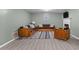 Living room with a fireplace, couches and chair with neutral decor, creating an inviting space at 7916 Foxwood Dr, Raleigh, NC 27615