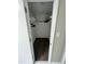 Walk-in closet offers ample storage space with built-in shelves and wood-look floors at 80 Stoneridge Rd, Durham, NC 27705
