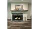 Elegant fireplace with decorative candles, a stylish mantel, and attractive decor at 80 Stoneridge Rd, Durham, NC 27705