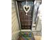 Inviting front door with a heart-shaped wreath and a colorful 'Hello' welcome mat at 80 Stoneridge Rd, Durham, NC 27705