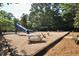 Community playground area with swings and a slide, perfect for Gathering fun at 80 Stoneridge Rd, Durham, NC 27705
