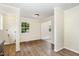 Dining Room with natural light, laminate floors, and access to other rooms at 919 Chester St, Durham, NC 27701