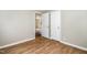 Hallway with light-colored walls and a hardwood floor at 919 Chester St, Durham, NC 27701
