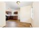 An open kitchen area featuring dark wood cabinets and a window for natural light at 919 Chester St, Durham, NC 27701
