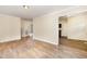 Open-concept living room featuring modern hardwood flooring and ample natural light at 919 Chester St, Durham, NC 27701