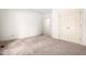 Bedroom featuring carpet, a closet, and neutral paint at 101 Turnberry Ln, Cary, NC 27511