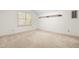 Inviting bedroom featuring plush carpeting and a bright window at 101 Turnberry Ln, Cary, NC 27511