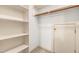 Organized closet with shelving on one side and a clothes rod above at 101 Turnberry Ln, Cary, NC 27511