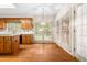 Kitchen nook with light-colored countertops, windows, and hardwood floors at 101 Turnberry Ln, Cary, NC 27511