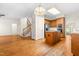 Traditional kitchen with a central island, hardwood floors, stainless steel appliances, and wood cabinetry at 101 Turnberry Ln, Cary, NC 27511
