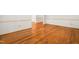 Hardwood floors and white trim highlight this expansive living room, perfect for entertaining at 101 Turnberry Ln, Cary, NC 27511