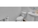 Half bathroom featuring a pedestal sink, wood-look flooring, and toilet at 111 S Rose Hill Dr, Clayton, NC 27520