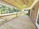 Spacious back porch offering a great space for outdoor living and entertaining at 112 Saddletree Rd, Oxford, NC 27565