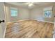 Bright, airy bedroom with ample natural light and wooden floors provides comfortable living at 112 Saddletree Rd, Oxford, NC 27565
