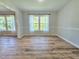 Bright dining room with neutral walls and wooden floors provides a serene dining atmosphere at 112 Saddletree Rd, Oxford, NC 27565