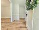 Welcoming foyer with warm-toned hardwood floors and views into the living room and dining areas at 112 Saddletree Rd, Oxford, NC 27565