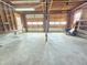 Spacious garage with plenty of room for storage and a double garage door at 112 Saddletree Rd, Oxford, NC 27565