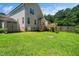 Expansive backyard features a wooden deck and a convenient storage shed, perfect for outdoor living and storage at 11612 Leesville Rd, Raleigh, NC 27613