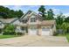Charming home with a two-car garage and well-maintained landscaping at 11612 Leesville Rd, Raleigh, NC 27613