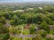 Aerial view showcases homes surrounded by lush greenery, offering a serene and private living environment at 132 Lord Ashley Rd, Raleigh, NC 27610