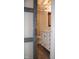 Charming powder room with a decorative barn door and a classic vanity at 1418 Sherron Rd, Durham, NC 27703