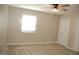 Bedroom with a neutral color palette, carpet floors, and ceiling fan at 1418 Sherron Rd, Durham, NC 27703