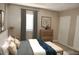 Bedroom with neutral walls, ample natural light, dresser, and white headboard at 1418 Sherron Rd, Durham, NC 27703