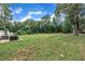 Spacious backyard with lush green lawn, perfect for outdoor activities and entertaining at 152 Abundant Ave, Angier, NC 27501