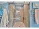 Beautiful bathroom with a glass door shower featuring unique tile and rainfall showerhead at 152 Abundant Ave, Angier, NC 27501