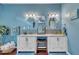 Charming bathroom features a double vanity with elegant mirrors and a central makeup area at 152 Abundant Ave, Angier, NC 27501