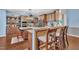 Stylish kitchen with granite countertops, island seating, and stainless steel appliances at 152 Abundant Ave, Angier, NC 27501