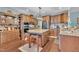 Gourmet kitchen features a central island, stainless steel appliances, and custom cabinetry at 152 Abundant Ave, Angier, NC 27501