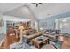 Cozy living room featuring hardwood floors and open access to the kitchen area at 152 Abundant Ave, Angier, NC 27501