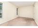 A neutral-toned bedroom features natural light from two windows and carpeted floor at 205 Ashley Forest Rd # Bldg D, Chapel Hill, NC 27514