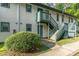 Exterior entrance to condo on a sunny day with trees around at 205 Ashley Forest Rd # Bldg D, Chapel Hill, NC 27514