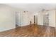 A bright living room with light walls, hardwood flooring, and a ceiling fan at 205 Ashley Forest Rd # Bldg D, Chapel Hill, NC 27514