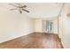A light-filled living room features attractive hardwood flooring and sliding glass doors at 205 Ashley Forest Rd # Bldg D, Chapel Hill, NC 27514