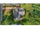 Birds eye view of house with large mature trees and landscaping at 211 Forestview Dr, Elon, NC 27244