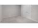 Neutral bedroom featuring carpet and a closet, with natural light from a window at 211 Forestview Dr, Elon, NC 27244