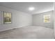 Spacious bedroom with neutral walls, carpet, and windows for natural light at 211 Forestview Dr, Elon, NC 27244