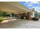 Brick house with an attached carport and outdoor space for entertaining at 211 Forestview Dr, Elon, NC 27244