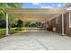 Covered carport and patio area offer a versatile outdoor space at 211 Forestview Dr, Elon, NC 27244