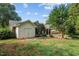 Detached garage and covered parking in a well-maintained backyard at 211 Forestview Dr, Elon, NC 27244