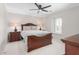 Bedroom with a beautiful wood bed frame and matching bedside tables at 213 Brompton Ct, Burlington, NC 27215