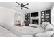Living room with fireplace, shelving, and open doorway at 213 Brompton Ct, Burlington, NC 27215